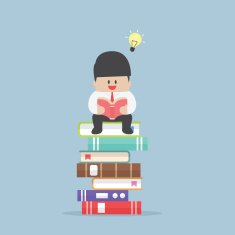 Businessman sitting on the stack of book and read it N2