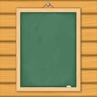 Blackboard on wooden wall