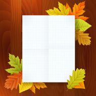autumn blank notepad on wood background