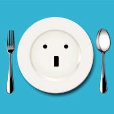 Wonder face draw on white plate with spoon and fork