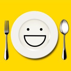 Smile face draw on white plate with spoon and fork N2