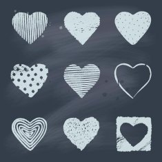 Set of hand drawn hearts on blackboard