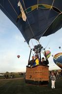 people in a hot air balloon, albuquerque, new mexico