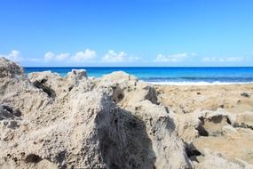 white rocks on the shoreline