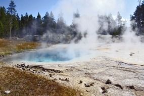 steam over the pond in Yellowstone National Park, Wyoming