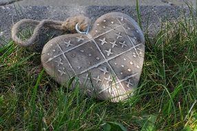 stone heart on the grass