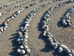 Stones laid out in a row for meditation.