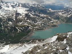 panorama of a lake in a mountain valley in Italy