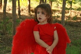 girl in a red angel costume