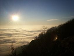 sunrise over the ocean on a cliff background