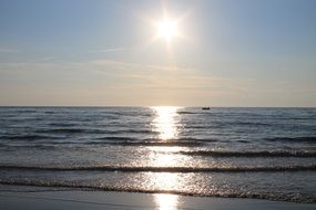 bright sun over the north sea on the horizon