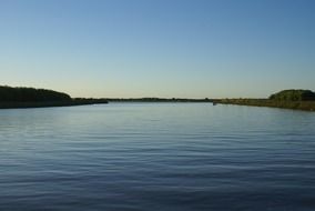 clear sky over a blue river