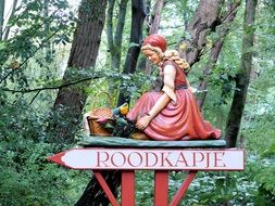 image of a red cap in the enchanted forest