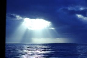 sunlight over the blue ocean
