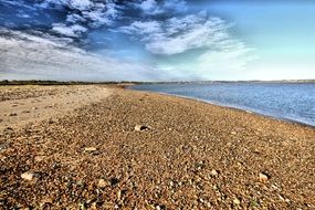stony sandy beach panorama
