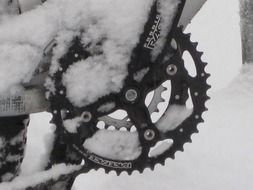 snow on a mountain bike chain