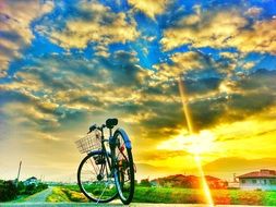 Picture of the bike at the background of sunset