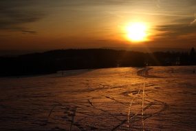 sunset in the snowy mountains