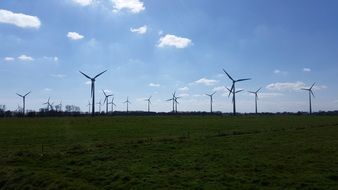 lot of wind turbines in the fields of East Frisia