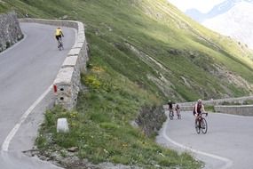 cyclists on a mountain serpentine