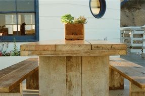 table with benches on the pier