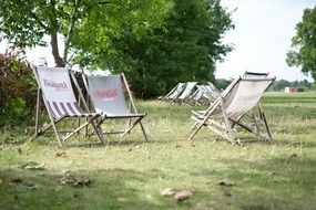 free chairs on green lawn