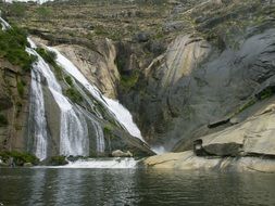 waterfall on the rocks near the river