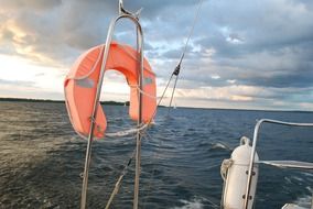 life buoy on sailing yacht at sea