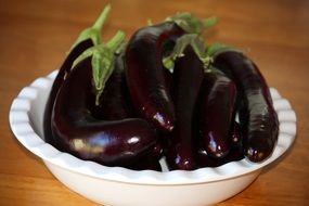 eggplants in a white bowl
