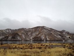 mountain on a lake bank