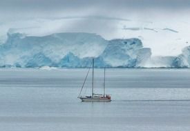 distant view of a ship off the coast of Antarctica