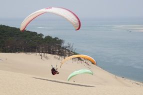 mountain paraglider fly