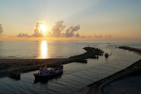 pier at sunset in poland