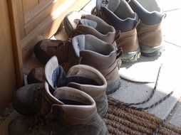 Hiking shoes near a door