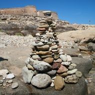 tower with pebbles on a rock