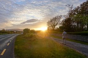 road in ireland at sunset