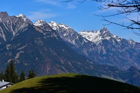 mountain peaks over the hill