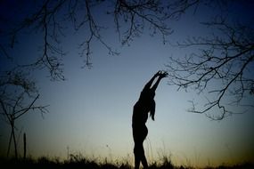 girl in the movement at sunset
