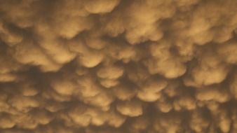 dark clouds in the sky at dusk
