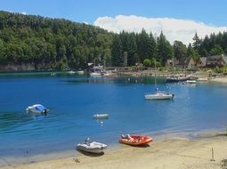 boats on the coast of Villa La Angostura