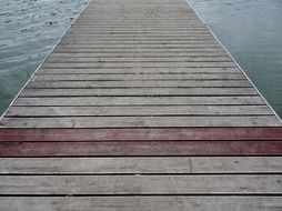 wooden jetty on the lake close up