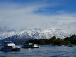 boats near the coast of New Zealand in the otago