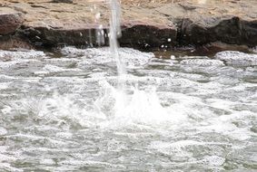 splashing water of waterfall