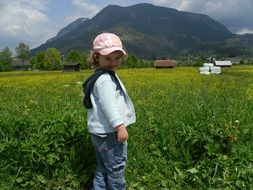 little girl on the mountain background