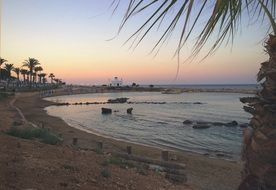 sunset over the beach in cyprus