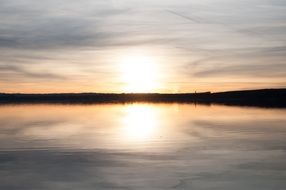 sunset over the lake in bavaria