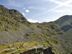 panoramic view of the rocky alps on a sunny day