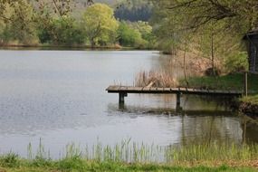 landscapeof fishing pier on a rural lake