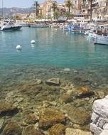 blue water at the rocks in the port