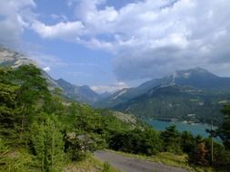 distant view of a lake in the mountains of france